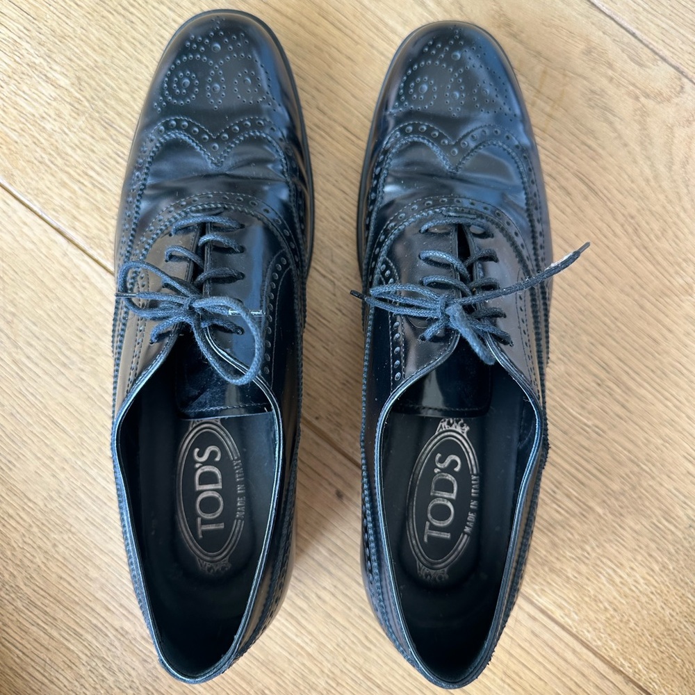 Tod's Woman’s Glossy Black Leather Oxfords w/ Rubber soles